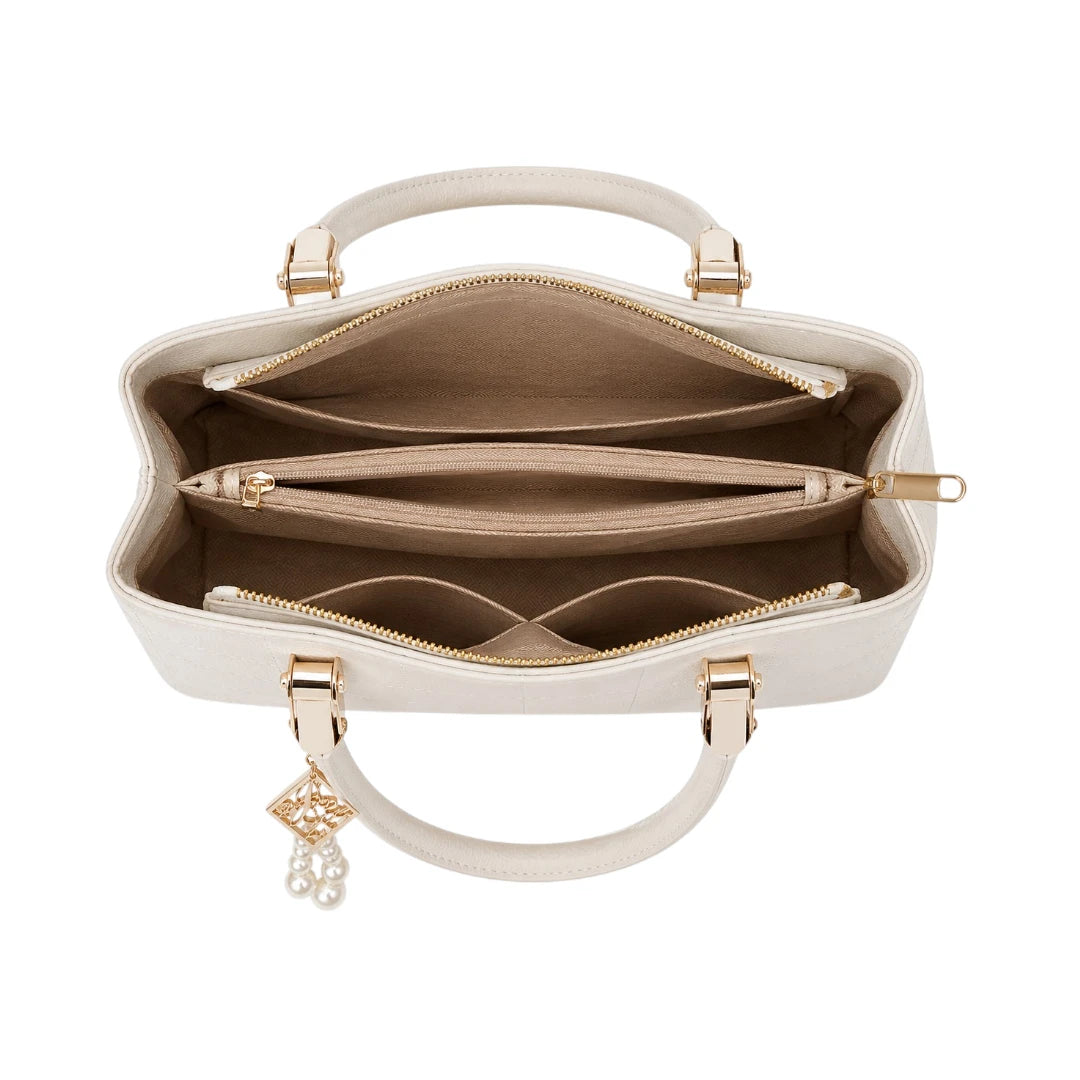 Mbela Elegant Ivory Leather Quilted Handbag with Pearl Charm