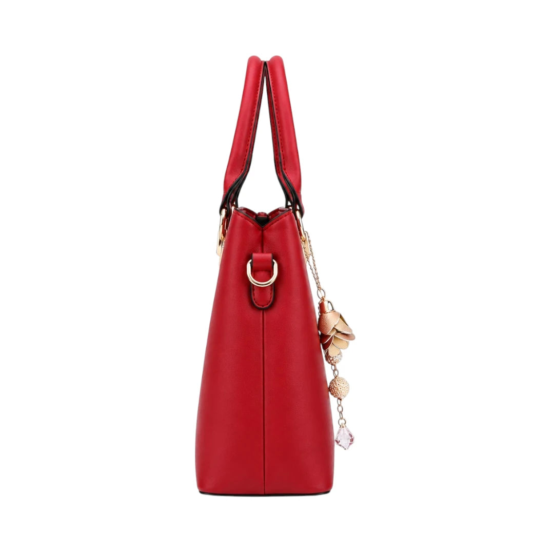 Mbela Scarlet Leather Handbag with Elegant Gold Floral Charm